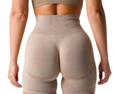 Women's Yoga Shorts in beige, offering a comfortable and flexible fit for fitness and exercise.