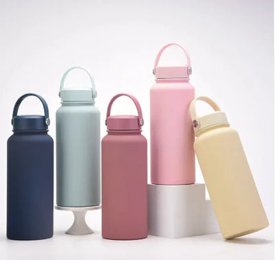 Steel Sport Max stainless steel sports kettles in assorted colors showing sleek design and easy-carry handles.