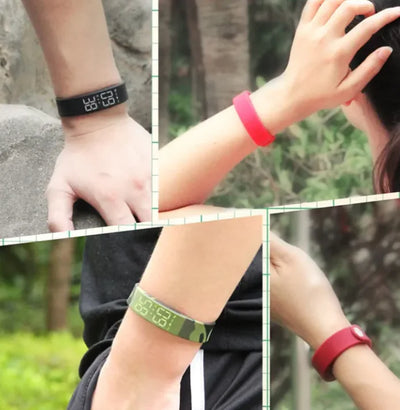 Sport Smart Watch in black, red, and green silicone straps, ideal for children, adults, and business professionals, featuring waterproof and sleep monitoring functions.