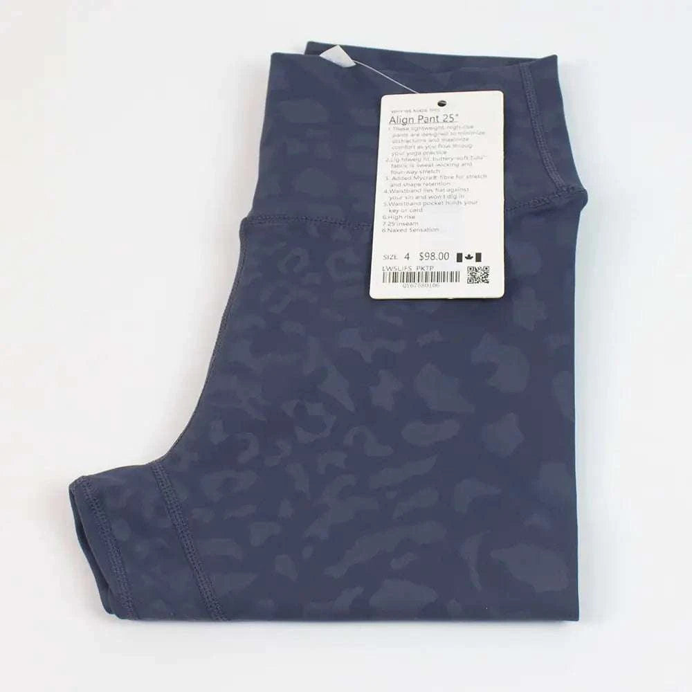 High Waist Hip Lift trousers in navy blue with tag showing product details.