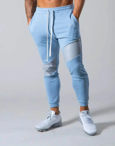 Trendy men's slim fit casual exercise trousers in sky blue, featuring a middle waist and moisture-wicking fabric.