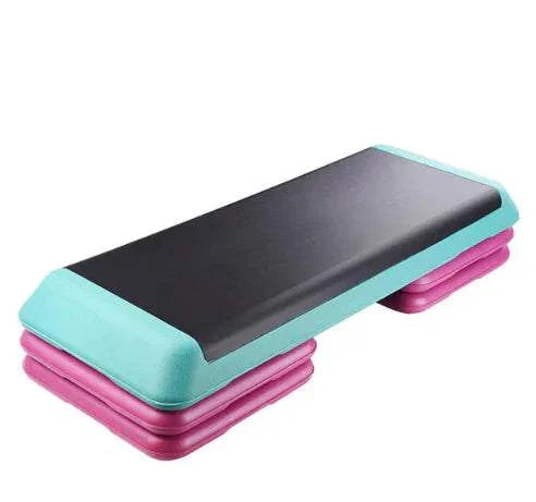 Fitness step board for aerobics and exercise in vibrant colors.