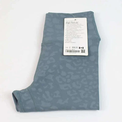 High Waist Hip Lift trousers in light grass color with subtle pattern.