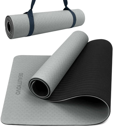 Extra thick yoga mat with strap, non-slip, eco-friendly TPE material, ideal for yoga, Pilates, and floor exercises.